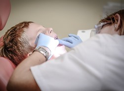Fountain Valley CA pediatric dental hygienist with patient
